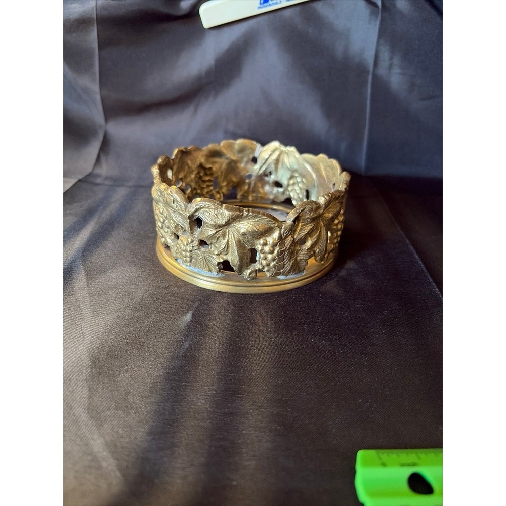 Brass bottle coster